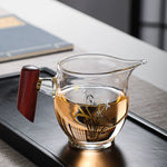 Load image into Gallery viewer, Elegant Hand-Blown Glass Tea Pitcher with Wooden Handle